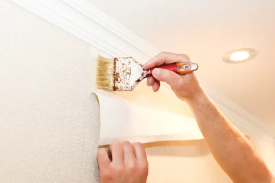 Pose de papier peint à Audignies — revêtements muraux et toiles de verre